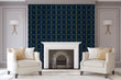 Load image into Gallery viewer, Blue and gold geometric antique Art Deco fabric peel and stick wallpaper in room with chairs and fireplace
