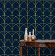 Load image into Gallery viewer, Blue and gold geometric antique Art Deco fabric peel and stick wallpaper with table and gold jars
