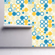 Load image into Gallery viewer, Vintage retro geometric blue and yellow fabric peel and stick wallpaper partially rolled up

