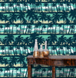 Load image into Gallery viewer, Blue coastal tropical palm trees fabric peel and stick wallpaper with table and gold jars
