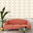 Load image into Gallery viewer, Gold antique geometric Art Deco fabric peel and stick wallpaper with pink sofa a plant

