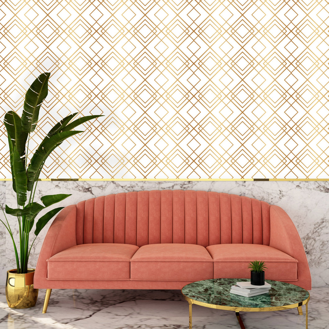 Gold antique geometric Art Deco fabric peel and stick wallpaper with pink sofa a plant