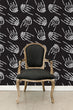 Load image into Gallery viewer, Hand bones gothic black and white fabric peel and stick wallpaper with black chair
