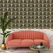 Load image into Gallery viewer, Black and gold geometric Art Deco fabric peel and stick wallpaper with pink sofa, table and plant
