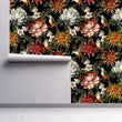Load image into Gallery viewer, Vintage floral botanical bird fabric peel and stick wallpaper on wall partially rolled up
