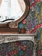Load image into Gallery viewer, Dark floral botanical fabric peel and stick wallpaper with mirror and table
