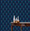 Load image into Gallery viewer, Blue and gold Art Deco geometric peacock fabric fabric peel and stick wallpaper table with gold bottles

