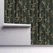 Load image into Gallery viewer, Grey and gold geometric Art Deco fabric peel and stick wallpaper on wall partially rolled up
