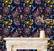 Load image into Gallery viewer, Blue and purple botanical floral hummingbird fabric peel and stick wallpaper with fireplace mantle and plant
