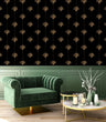 Load image into Gallery viewer, Black and gold vintage Art Deco geometric fabric peel and stick wallpaper with green chair and coffee table
