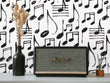 Load image into Gallery viewer, Black and white music notes fabric peel and stick wallpaper with radio and plant
