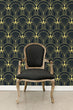 Load image into Gallery viewer, Black and gold vintage antique Art Deco fabric peel and stick wallpaper with black chair
