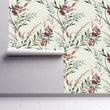 Load image into Gallery viewer, Purple lavender antique vintage cottage botanical fabric peel and stick wallpaper on wall partially rolled up
