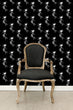 Load image into Gallery viewer, Black gothic skeleton mermaid cat fabric peel and stick wallpaper with black chair
