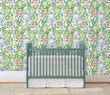 Load image into Gallery viewer, Green and blue wildflower garden cottage fabric peel and stick wallpaper with crib
