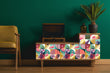 Load image into Gallery viewer, 80s pink and blue tropical retro fabric peel and stick wallpaper with vintage radio, plant and chair
