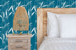 Load image into Gallery viewer, Blue bamboo botanical Asian fabric peel and stick wallpaper with bed, nightstand and lamp
