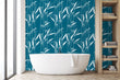 Load image into Gallery viewer, Blue bamboo botanical Asian fabric peel and stick wallpaper in bathroom with bathtub and shelves
