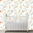 Load image into Gallery viewer, Colorful botanical bird fabric peel and stick wallpaper in nursery with crib
