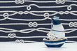 Load image into Gallery viewer, Blue and white nautical rope and knots fabric peel and stick wallpaper with decorative boat
