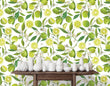 Load image into Gallery viewer, Green citrus limes vintage floral fabric peel and stick wallpaper with table and white jars
