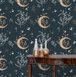 Load image into Gallery viewer, Witchy boho dark moon and stars fabric wallpaper with table and gold jars
