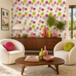 Load image into Gallery viewer, Cozy boucle lounge chairs and warm walnut furniture complement Stella Road wallpaper by Pickwick &amp; Elm, adding playful mid-century modern style to this bright living room.
