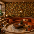 Load image into Gallery viewer, This conversation pit features Pickwick &amp; Elm's Sydney Place wallpaper as a dramatic backdrop, blending oversized vintage floral patterns with iconic retro living room design.
