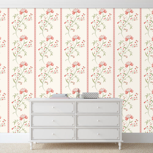 Pink vintage floral fabric peel and stick wallpaper with white dresser