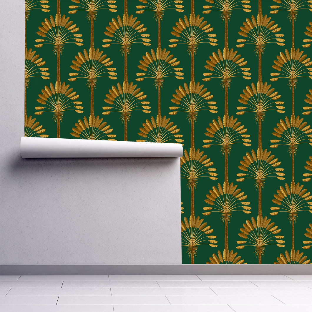 Gold and green antique Art Deco fabric peel and stick wallpaper on wall partially rolled up