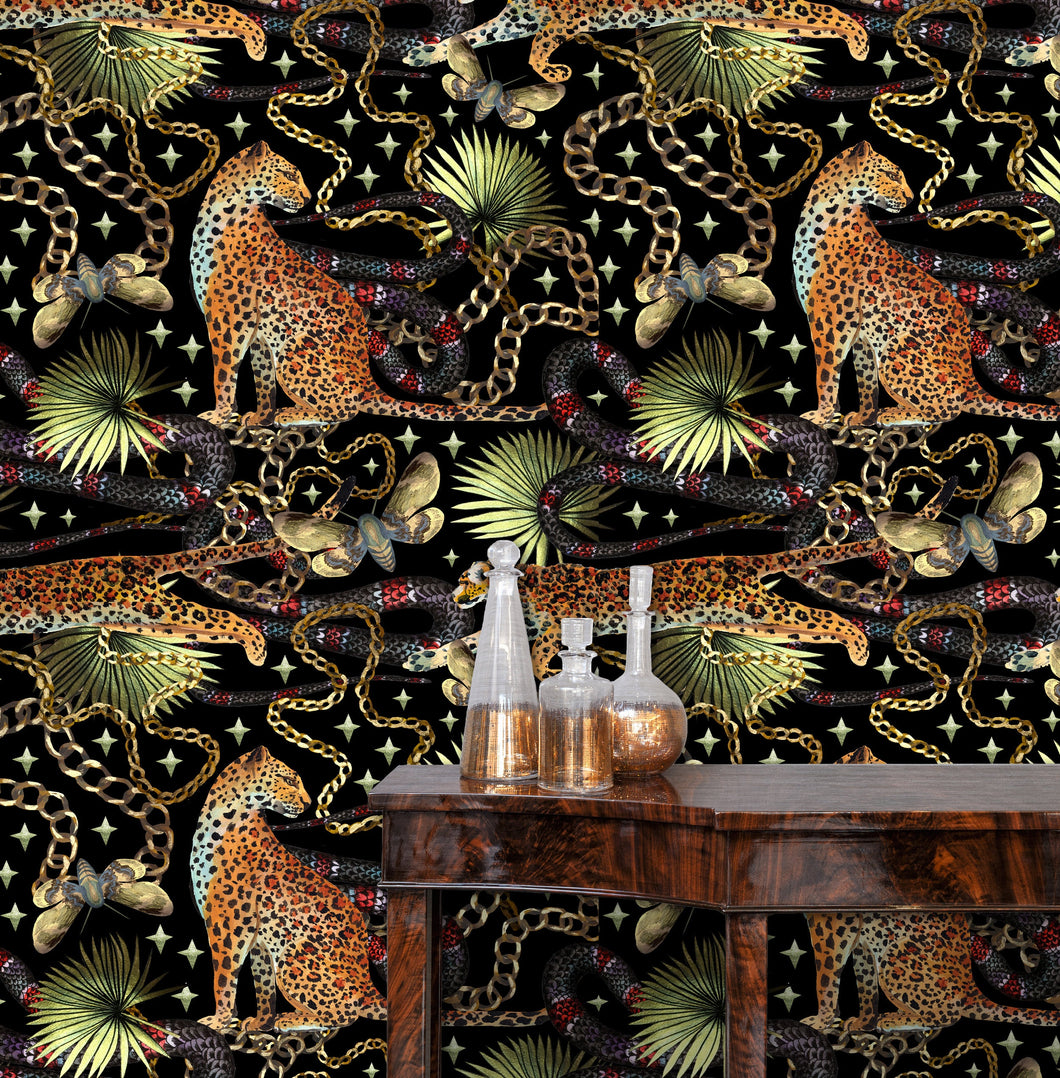 Black tropical cheetah print fabric peel and stick wallpaper with table and gold jars