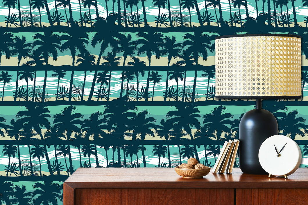 Blue coastal tropical palm trees fabric peel and stick wallpaper with cabinet, lamp and clock