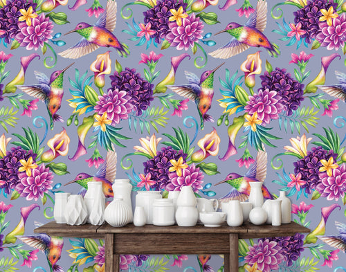 Purple and blue botanical floral hummingbird fabric peel and stick wallpaper with table and white vases