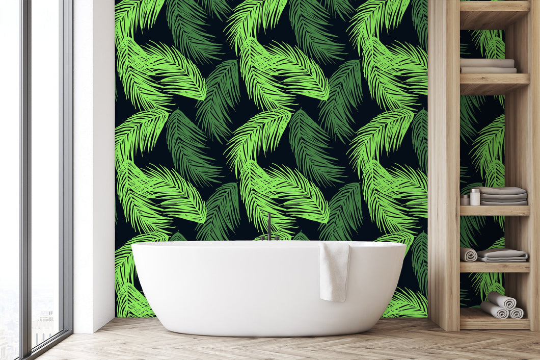 Neon green tropical palm leaves fabric peel and stick wallpaper in bathroom with bathtub and shelves