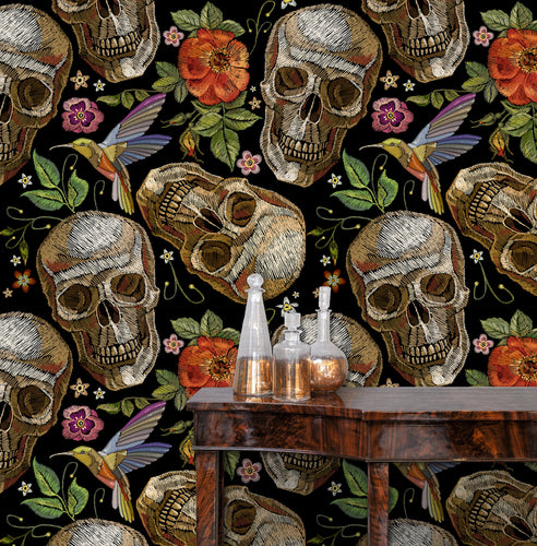 Black skull gothic bird botanical fabric peel and stick wallpaper with table and gold jars